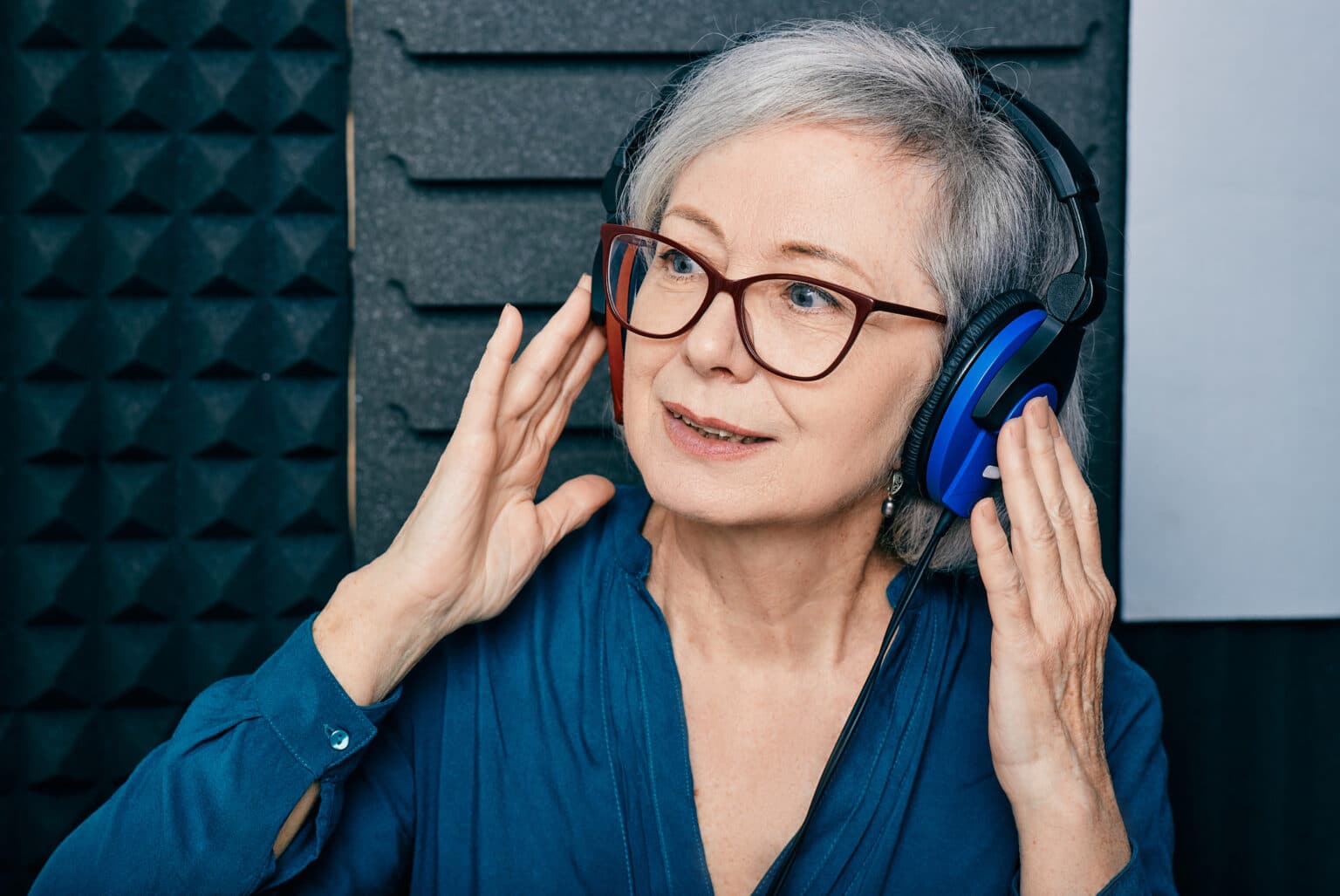 Senior woman getting a hearing test.